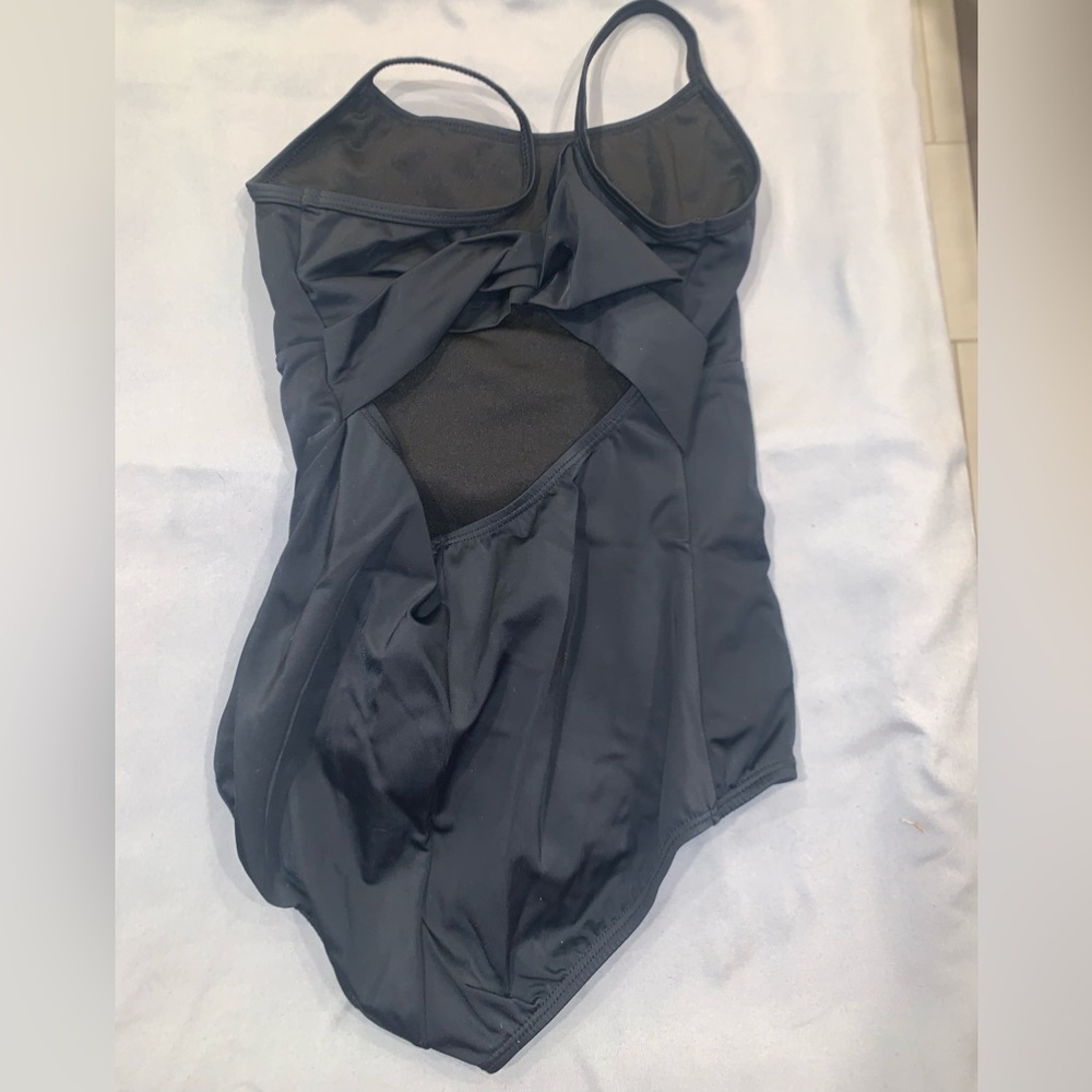 Black leo with criss cross back